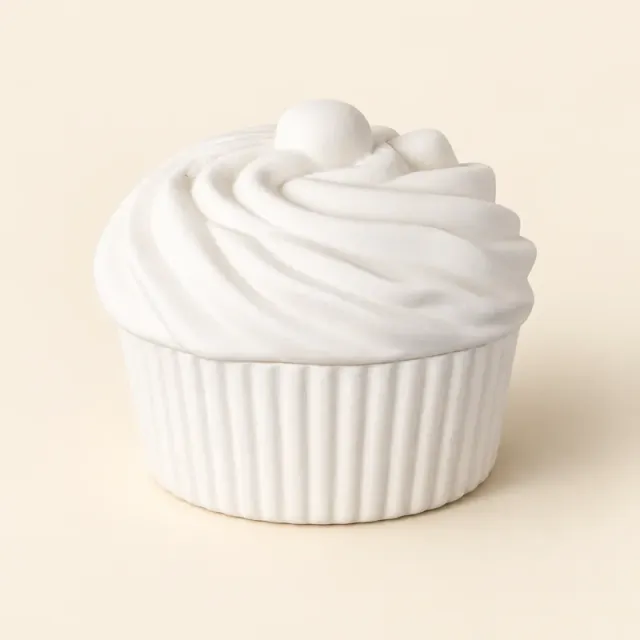 Unpainted white ceramic box shaped like a cupcake, with a swirled lid and a ridged base